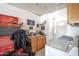 Functional utility room with storage cabinets and laundry appliances at 402 W Mohawk Ln, Phoenix, AZ 85027