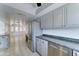 Spacious kitchen offering stainless steel appliances, ample cabinet space, and a view to the adjacent living area at 4023 W Joan De Arc Ave, Phoenix, AZ 85029