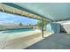 The backyard has a pool and covered patio providing an oasis for relaxation and outdoor enjoyment at 4023 W Joan De Arc Ave, Phoenix, AZ 85029