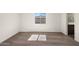 Cozy bedroom with neutral walls, plush carpeting, and a convenient en-suite bathroom at 4051 N Ghost Hollow Way, Casa Grande, AZ 85122