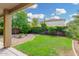 Well-maintained backyard with lush green lawn and mature landscaping at 4125 W Lydia Ln, Phoenix, AZ 85041