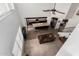 This shows the open concept of the kitchen and living room layout with access to the second floor at 4125 W Lydia Ln, Phoenix, AZ 85041