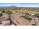 Impressive aerial capture of the meticulously designed golf course, offering both challenge and beauty in a park-like setting at 4517 E Sourwood Dr, Gilbert, AZ 85298