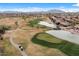 Breathtaking aerial view of the lush golf course and serene pond in this premier community, perfect for golfers at 4517 E Sourwood Dr, Gilbert, AZ 85298