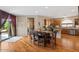 Bright dining area features hardwood floors and sliding glass doors to the backyard patio at 4517 E Sourwood Dr, Gilbert, AZ 85298