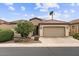 Charming single-story home with tile roof, desert landscaping, and a two-car garage at 4517 E Sourwood Dr, Gilbert, AZ 85298