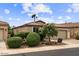 Charming home featuring a tile roof, well-manicured landscaping, and an attached two-car garage at 4517 E Sourwood Dr, Gilbert, AZ 85298
