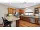 Well-appointed kitchen features stainless steel appliances, breakfast bar, and ample counter space at 4517 E Sourwood Dr, Gilbert, AZ 85298