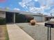 Well-maintained home with a spacious two-car garage, desert landscaping, and a welcoming entrance at 4549 W Seldon Ln, Glendale, AZ 85302