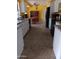 An open kitchen features white cabinets, stainless steel appliances, and granite counters at 4549 W Seldon Ln, Glendale, AZ 85302