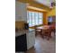 This kitchen features granite counters, tile flooring, and a bay window at 4549 W Seldon Ln, Glendale, AZ 85302