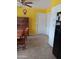 This kitchen features a dining area, yellow walls, and tile flooring at 4549 W Seldon Ln, Glendale, AZ 85302