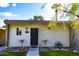 Charming front entrance with a black door, desert landscaping, and a well-manicured lawn at 4800 N 68Th St # 314, Scottsdale, AZ 85251