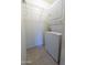Convenient laundry room equipped with a stacked washer and dryer unit at 4800 N 68Th St # 314, Scottsdale, AZ 85251