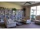 Cozy library with floor-to-ceiling bookshelves and comfortable seating at 4800 N 68Th St # 314, Scottsdale, AZ 85251