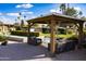 Covered outdoor lounge area with comfortable seating, perfect for relaxing and entertaining at 4800 N 68Th St # 314, Scottsdale, AZ 85251