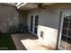 Secluded patio with pavers, artificial turf, and lush plants, perfect for relaxing and entertaining at 4800 N 68Th St # 314, Scottsdale, AZ 85251
