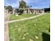 Lush green lawns and walking paths create a serene atmosphere in the community at 533 W Guadalupe Rd # 1110, Mesa, AZ 85210