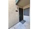 Inviting front door with secure iron gate and address number visible, offering security and curb appeal at 533 W Guadalupe Rd # 1110, Mesa, AZ 85210