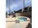 Community hot tub is surrounded by landscaped grounds and swaying palm trees at 533 W Guadalupe Rd # 1110, Mesa, AZ 85210