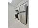 Well-lit kitchen with stainless steel fridge, microwave, and range at 533 W Guadalupe Rd # 1110, Mesa, AZ 85210
