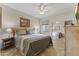 Comfortable bedroom with neutral tones, a ceiling fan, and mirrored closet at 5450 E Mclellan Rd # 145, Mesa, AZ 85205