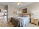 Cozy bedroom with a full bed, ceiling fan and warm neutral colors at 5450 E Mclellan Rd # 145, Mesa, AZ 85205