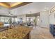 Open floor plan showing the living room and dining area, connected to the kitchen at 5450 E Mclellan Rd # 145, Mesa, AZ 85205