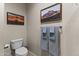 Neutral half bathroom with tasteful decor and plush blue towels at 5450 E Mclellan Rd # 145, Mesa, AZ 85205