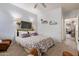 Comfortable bedroom featuring soft carpeting, ceiling fan and stylish decorations at 5450 E Mclellan Rd # 150, Mesa, AZ 85205