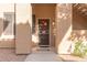 Close up of front entrance to building with front door and porch, and manicured landscape at 5450 E Mclellan Rd # 150, Mesa, AZ 85205