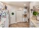 Open kitchen with white cabinets and granite countertops, offering a view to other living spaces at 5450 E Mclellan Rd # 150, Mesa, AZ 85205