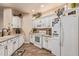 Charming kitchen with white cabinets, granite countertops and modern appliances at 5450 E Mclellan Rd # 150, Mesa, AZ 85205