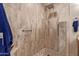 Tiled walk-in shower with a river rock shower floor and seat at 5450 E Mclellan Rd # 150, Mesa, AZ 85205