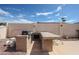 Backyard with BBQ and cooking area at 656 W Johnson Dr, Gilbert, AZ 85233