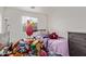 Cozy bedroom with natural light, showcasing a clean window and comfortable space at 7215 N 76Th Ave, Glendale, AZ 85303