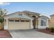 Single-story home with a two-car garage, tile roof, and neutral-toned exterior paint, ideal for easy living at 7215 N 76Th Ave, Glendale, AZ 85303