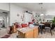 Open concept kitchen with oak cabinets, tile flooring, and plenty of countertop space at 7215 N 76Th Ave, Glendale, AZ 85303