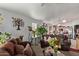 Cozy living room flowing into the kitchen with lots of natural light and comfortable seating at 7215 N 76Th Ave, Glendale, AZ 85303