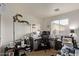 Bright home office featuring a built-in desk, natural light, and ample workspace at 7215 N 76Th Ave, Glendale, AZ 85303