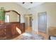 Well-lit bedroom with hardwood floors, a spacious closet, and classic dresser at 7517 E Mariposa Grande Dr, Scottsdale, AZ 85255