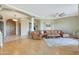 Spacious living room with an open floor plan, hardwood floors, and abundant natural light at 7517 E Mariposa Grande Dr, Scottsdale, AZ 85255
