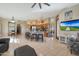 Spacious living area with kitchen island, fireplace, and comfortable furniture at 7517 E Mariposa Grande Dr, Scottsdale, AZ 85255