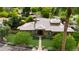 Expansive property boasting manicured lawns, mature trees, and a well-maintained house with distinctive architectural elements at 823 W Palo Verde Dr, Phoenix, AZ 85013