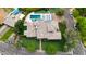 Beautifully landscaped property featuring a pool, hot tub, solar panels, and a well-maintained lawn at 823 W Palo Verde Dr, Phoenix, AZ 85013