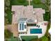 Overhead view of a home with solar panels, a pool, spa, and beautifully landscaped yard at 823 W Palo Verde Dr, Phoenix, AZ 85013
