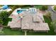 Luxury home with a swimming pool, hot tub, solar panels, well-manicured lawn, and uniquely designed roof at 823 W Palo Verde Dr, Phoenix, AZ 85013