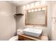 Modern bathroom featuring wood vanity with vessel sink and updated mirror at 823 W Palo Verde Dr, Phoenix, AZ 85013