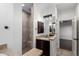 Full bathroom featuring stylish vanity and access to a tiled walk-in shower at 823 W Palo Verde Dr, Phoenix, AZ 85013