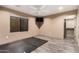 Neutral bedroom featuring a ceiling fan, closet, and light grey floors at 823 W Palo Verde Dr, Phoenix, AZ 85013